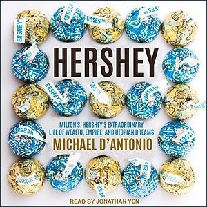 An audio book cover that features 18 gold and blue wrapped Hershey kisses. Hershey is in brown letters and the subtitle "Milton S Hershey's Extraordinary Life of Wealth, Empire, and Utopian Dreams: is in light blue letters. The Author's name is a gold as is the narrator's name.