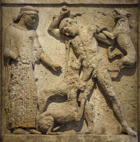 Artemis and Aktaion, the hunter who watched her bathe, torn apart by his own hunting dogs. In the myth, he is usually transformed into a stag first but here he is in human form as he is attacked by his dogs - or maybe they are Artemis' own hunting dogs?
Relief on a Metope from the Eastern frieze of the Temple E in Selinuntum, 460—450 BCE, Palermo, Regional Archaeological Museum