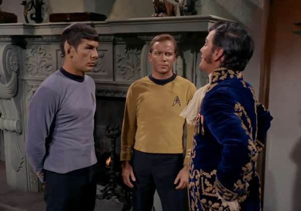 Spock, Kirk, and the Squire of Gothos standing in front of an ornate medieval fireplace


I object to you. I object to intellect without discipline. I object to power without constructive purpose