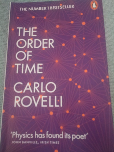 The Order of Time by Carlo Rovelli. The translators, not credited anywhere on front or back cover, are Erica Segre and Simon Carnell.