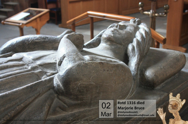 The picture shows the shoulders and head of a reclining stone figure with folded hands.