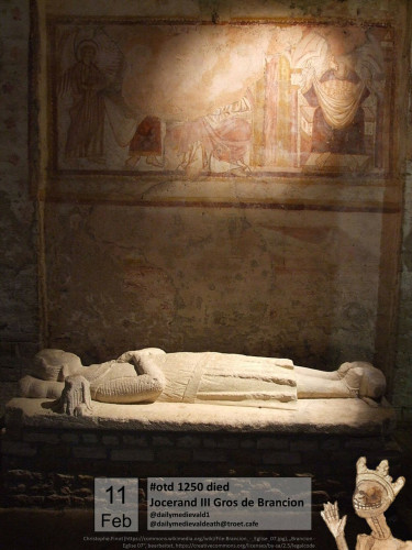 The picture shows a grave with a reclining figure.